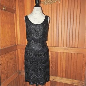 LBD- black dress detailed with sequins & fringe.